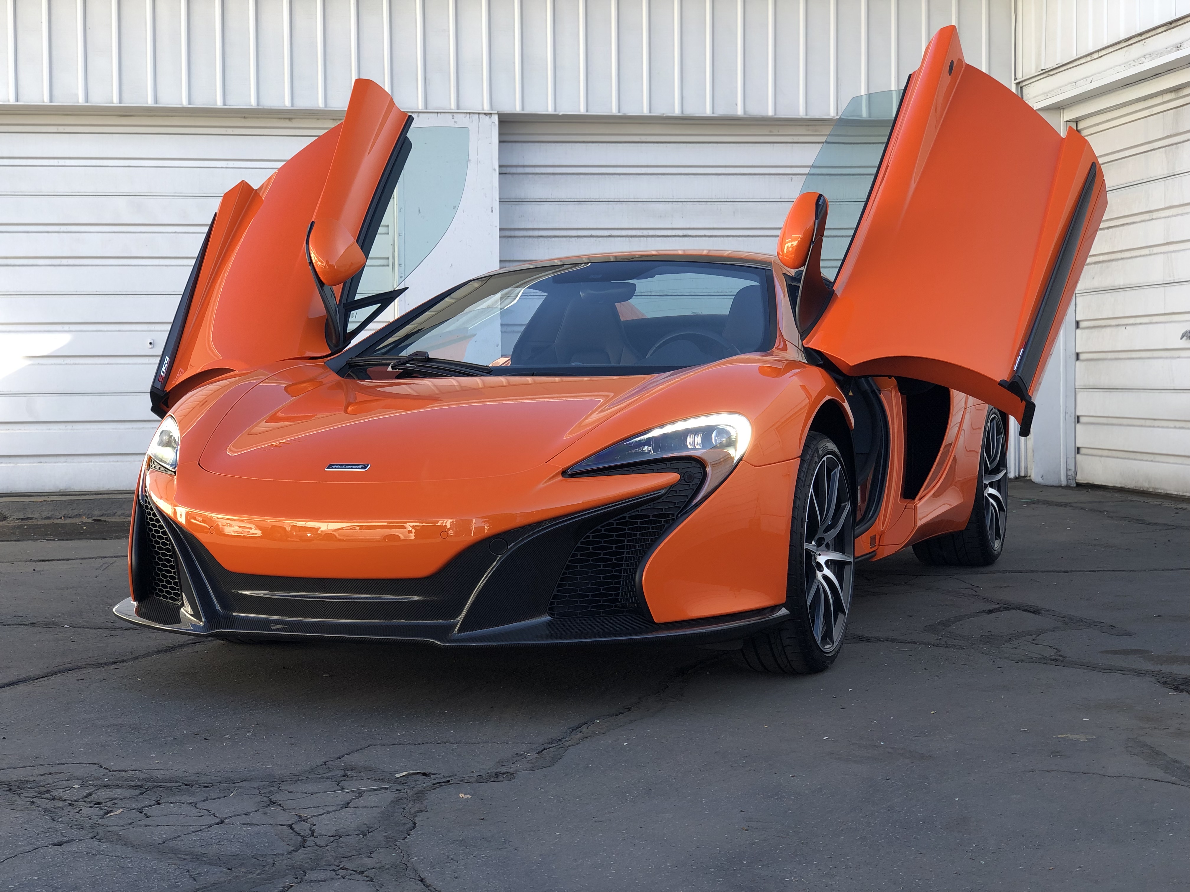 Orange McLaren with butterfly doors in Salt Lake City.